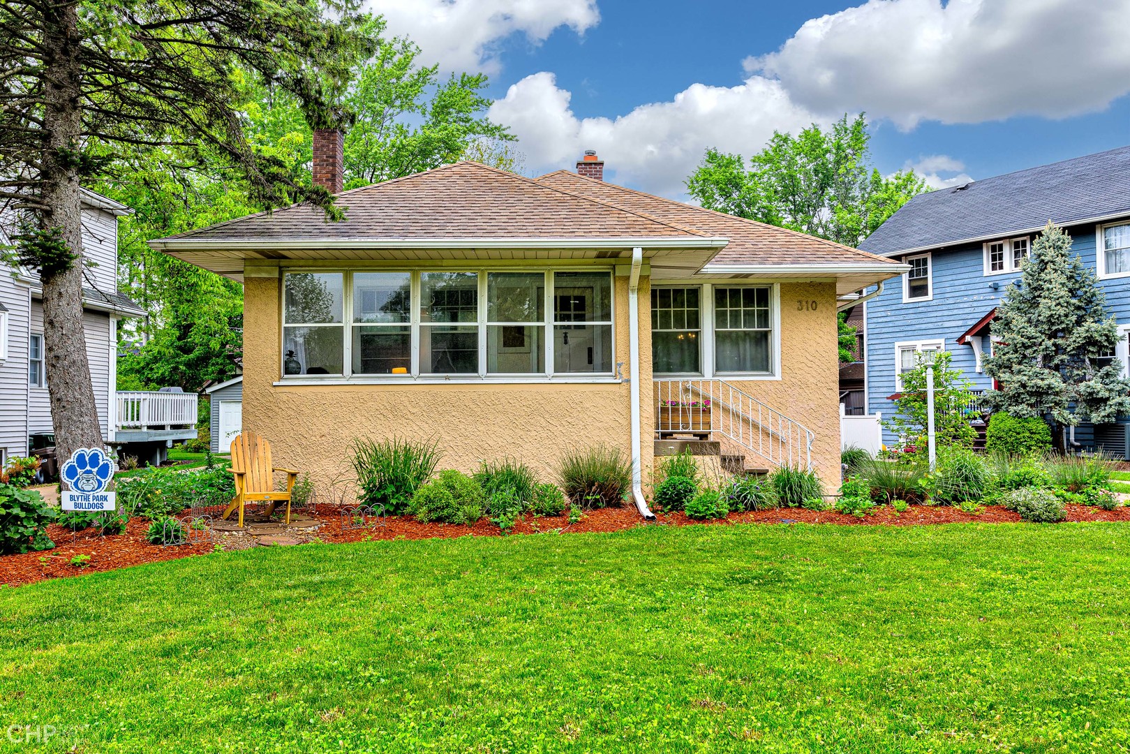 310 Shenstone Road Riverside, IL 60546 - Photo 2 of 32 a view of a house with garden and plants