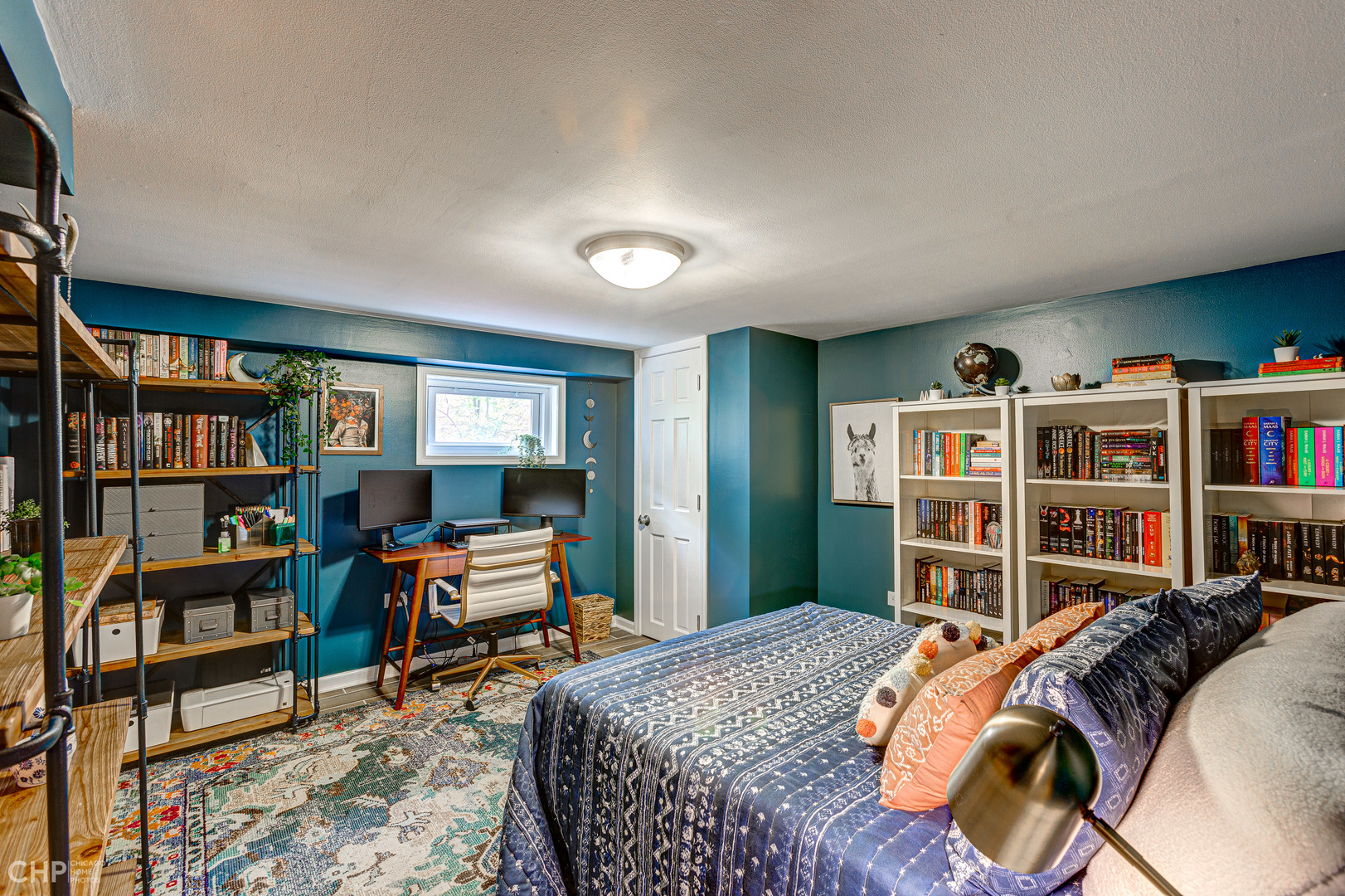310 Shenstone Road Riverside, IL 60546 - Photo 23 of 32 a bedroom with a bed and a book shelf