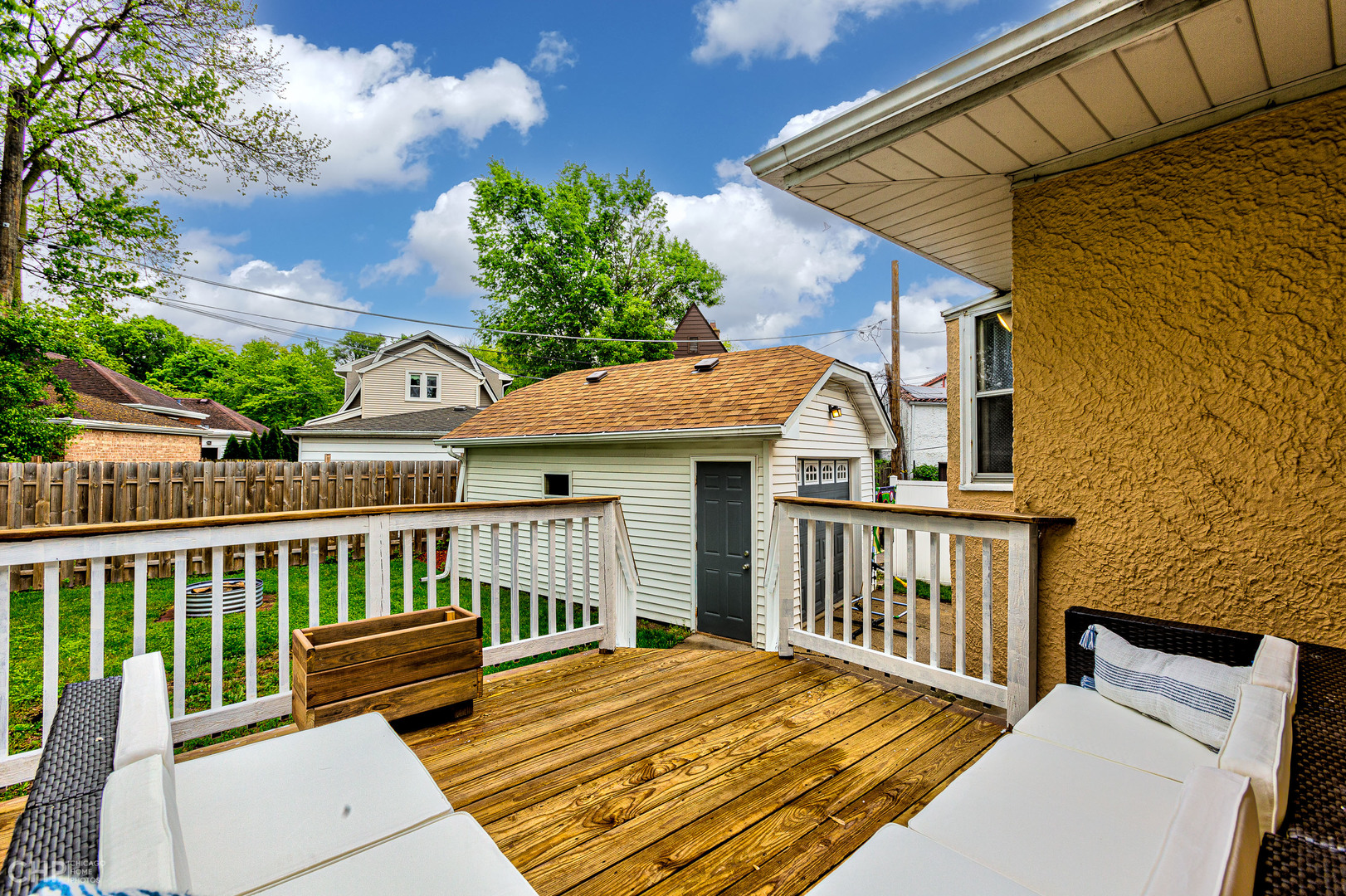 310 Shenstone Road Riverside, IL 60546 - Photo 28 of 32 a view of a wooden chairs on the deck