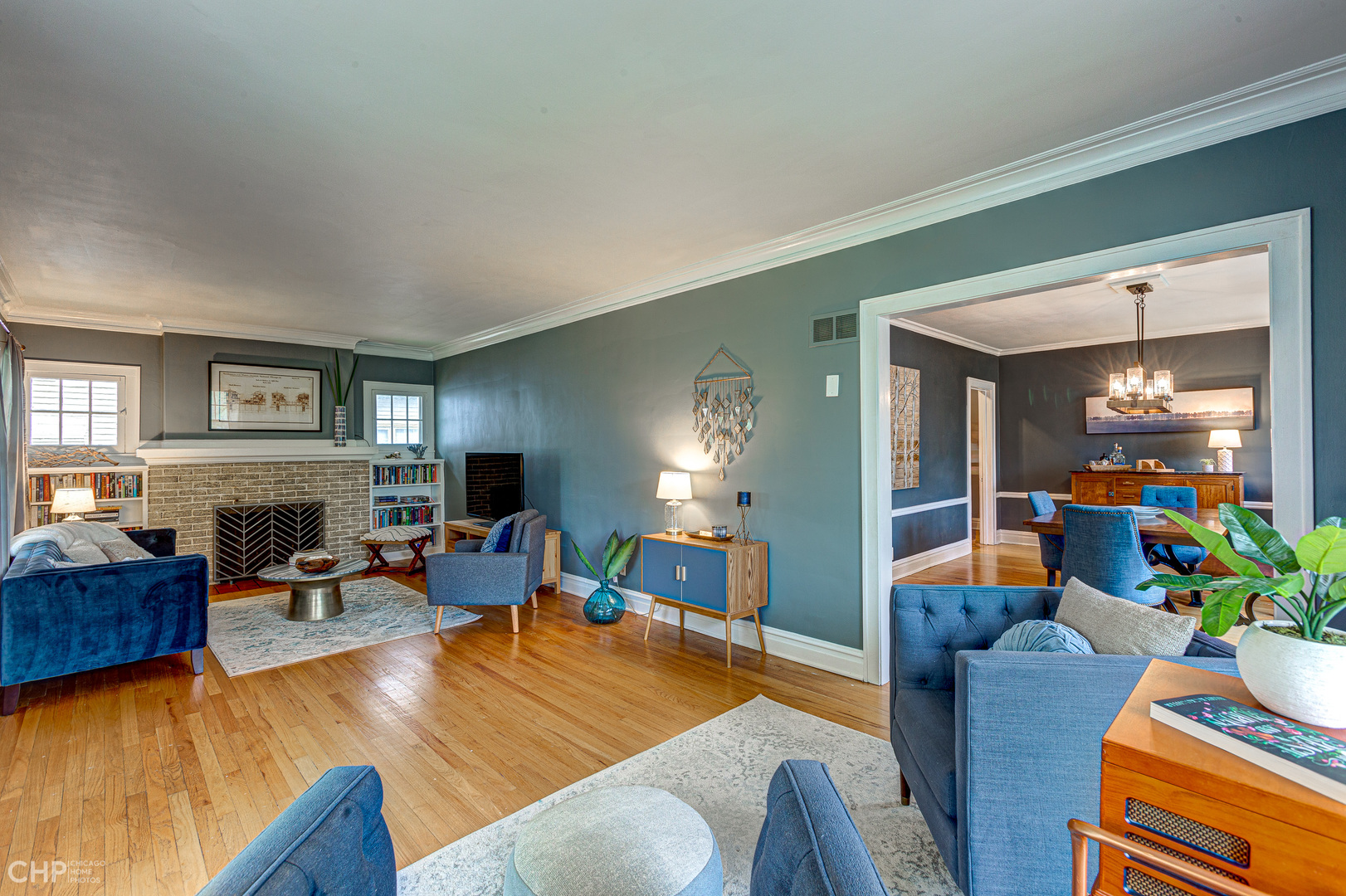 310 Shenstone Road Riverside, IL 60546 - Photo 5 of 32 a living room with furniture and a fireplace