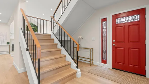 a view of staircase with wooden floor and staircase