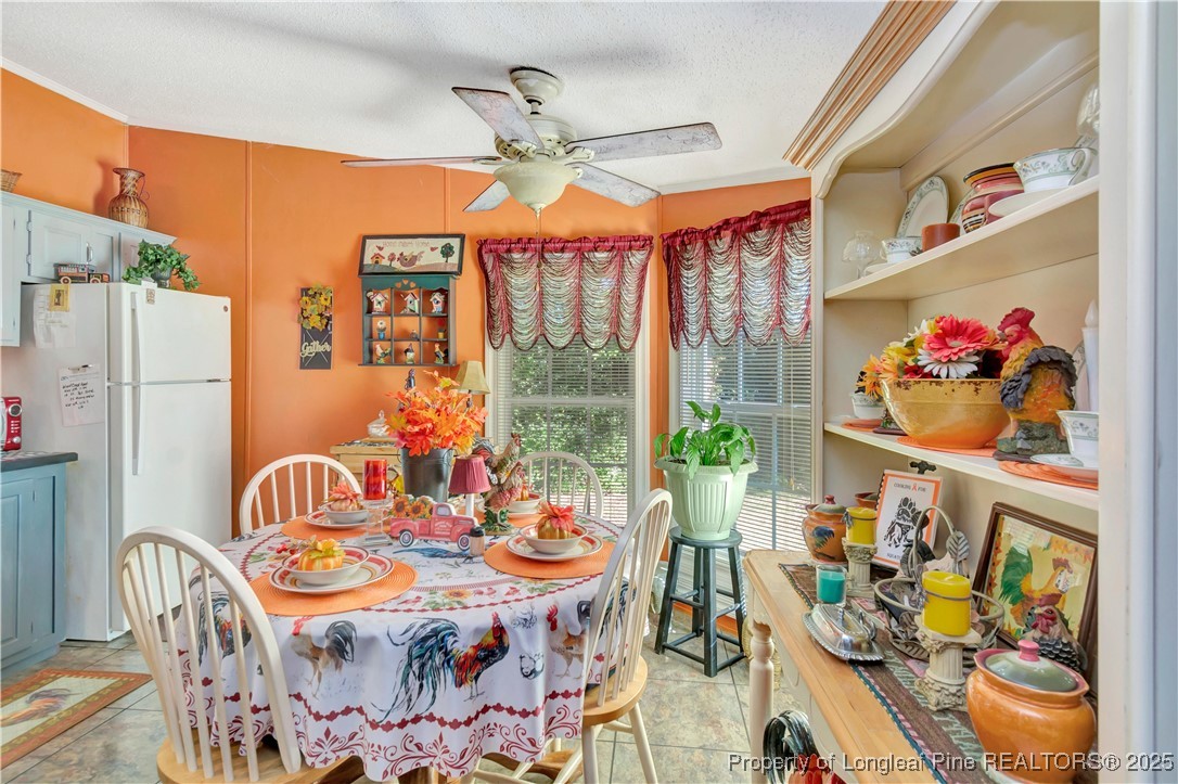 437 Paul Road Pembroke, NC 28372 - Photo 17 of 28 a bedroom with furniture and a large window