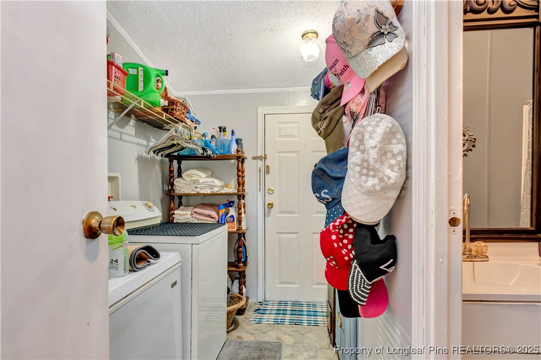 437 Paul Road Pembroke, NC 28372 - Photo 25 of 28 a bathroom with a sink mirror and vanity