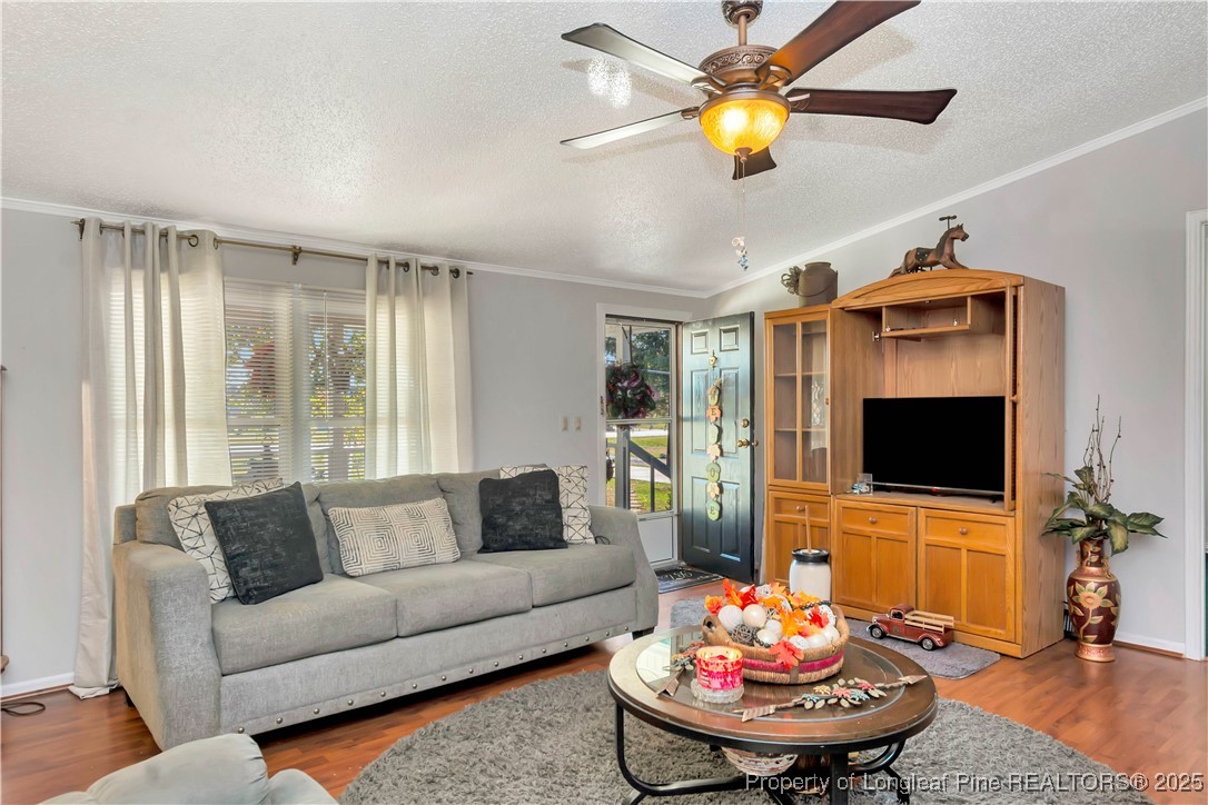 437 Paul Road Pembroke, NC 28372 - Photo 8 of 28 a living room with furniture and a flat screen tv
