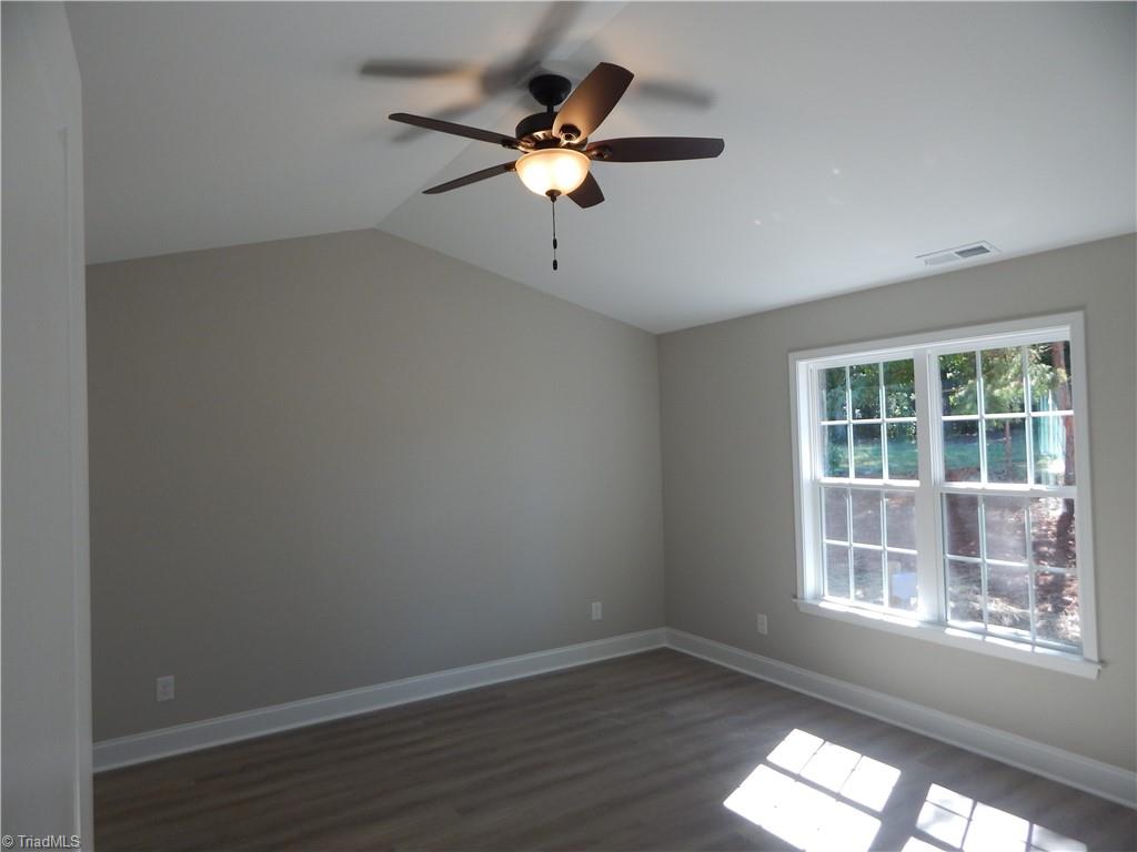 2126 Waterford Pointe Road Lexington, NC 27292 - Photo 7 of 15 Split bedroom plan offers privacy for primary bedroom with vaulted ceiling.