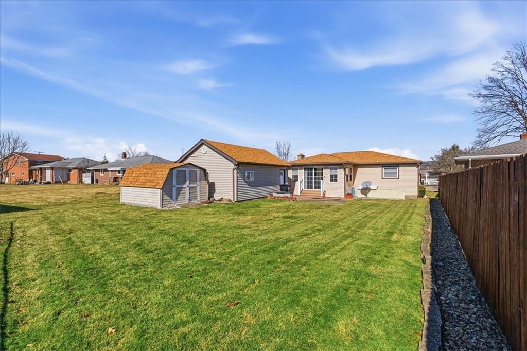 2355 Calvert Street Aliquippa, PA 15001 - Photo 4 of 28 a front view of a house with garden