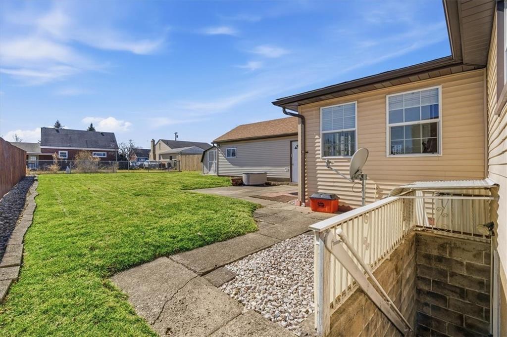 2355 Calvert Street Aliquippa, PA 15001 - Photo 5 of 28 a front view of a house with a yard