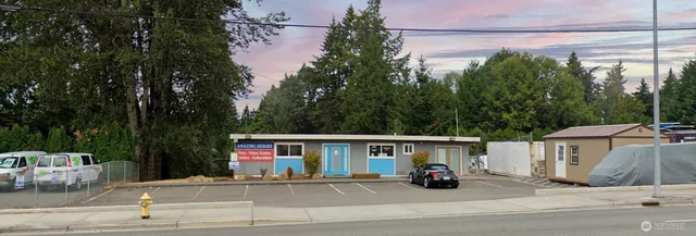 a view of house that has a patio