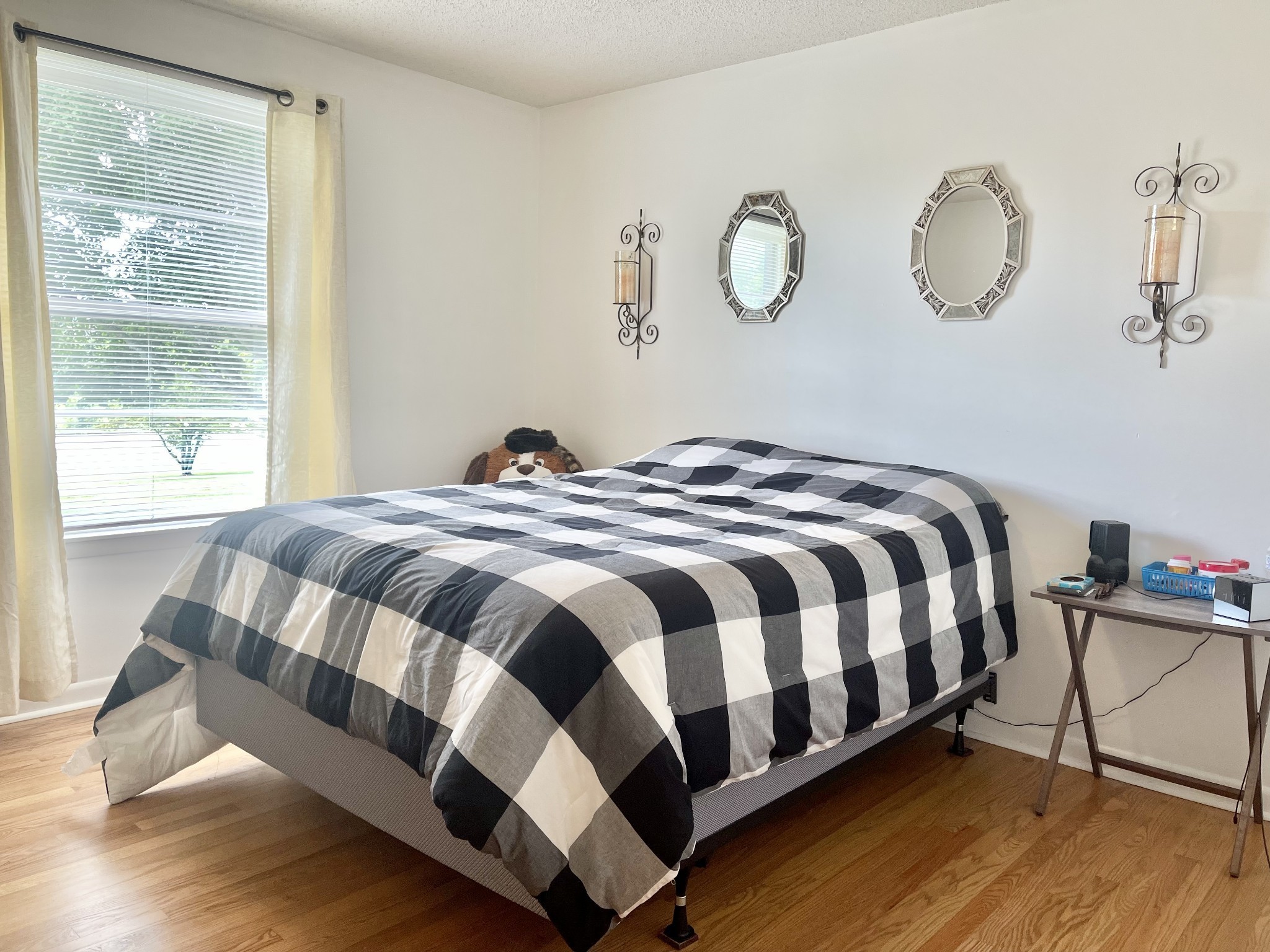 10515 Lebanon Road Mount Juliet, TN 37122 - Photo 11 of 13 a bedroom with a bed and wooden floor