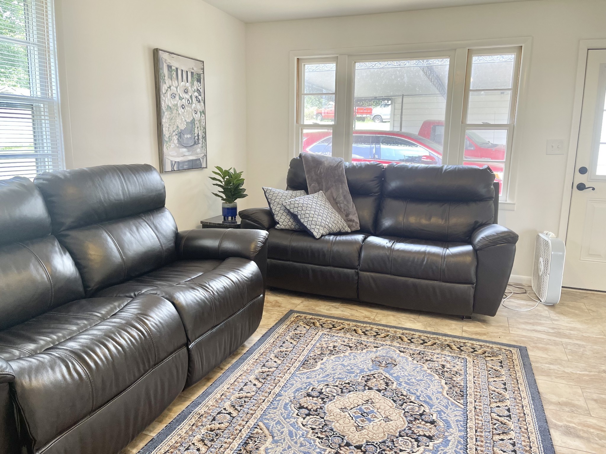 10515 Lebanon Road Mount Juliet, TN 37122 - Photo 7 of 13 a living room with a couch and a rug