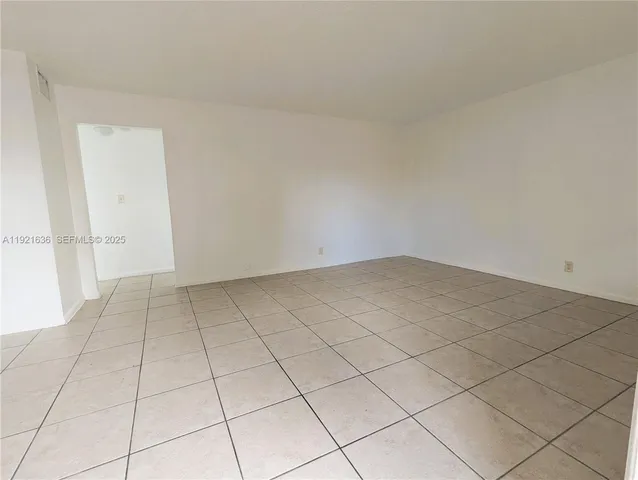 a view of a kitchen with windows