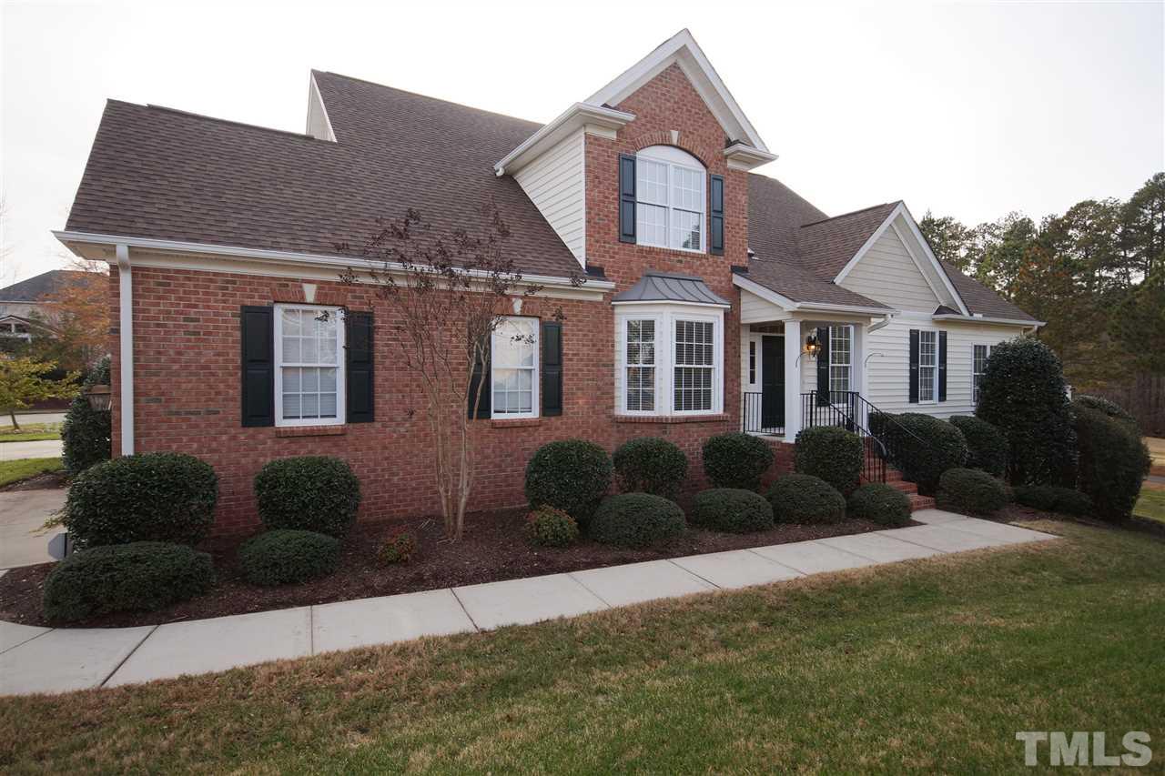 11032 Fair Chase Court Raleigh, NC 27617 - Photo 2 of 25 a front view of a house with a yard