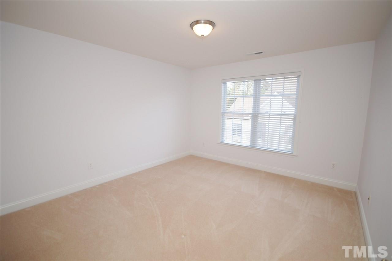 11032 Fair Chase Court Raleigh, NC 27617 - Photo 18 of 25 an empty room with a window