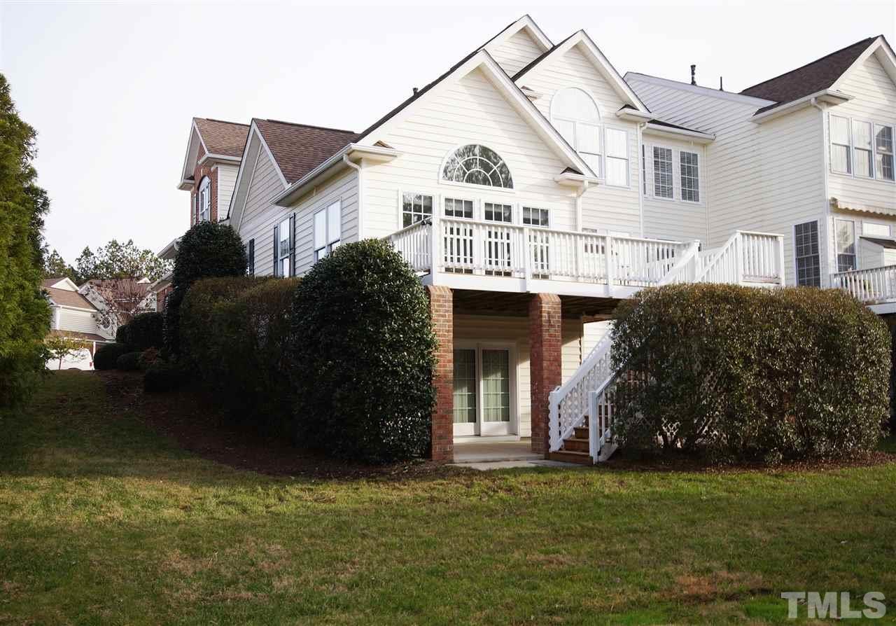 11032 Fair Chase Court Raleigh, NC 27617 - Photo 24 of 25 a front view of a house with a garden