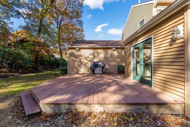 a view of a backyard with sitting area