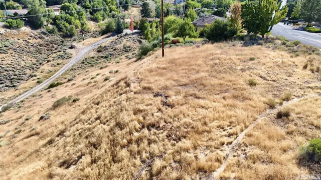 a view of a backyard of a house