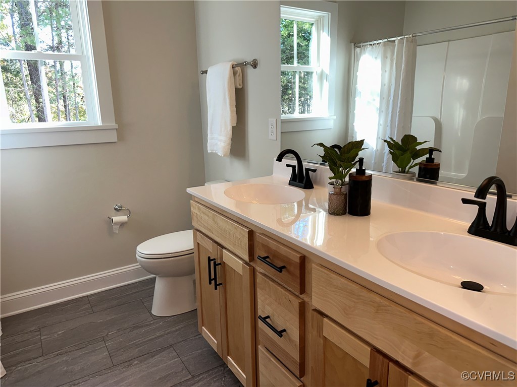 10621 Trents Bridge Road Chesterfield, VA 23838 - Photo 37 of 50 Hall bath has double sinks and tub