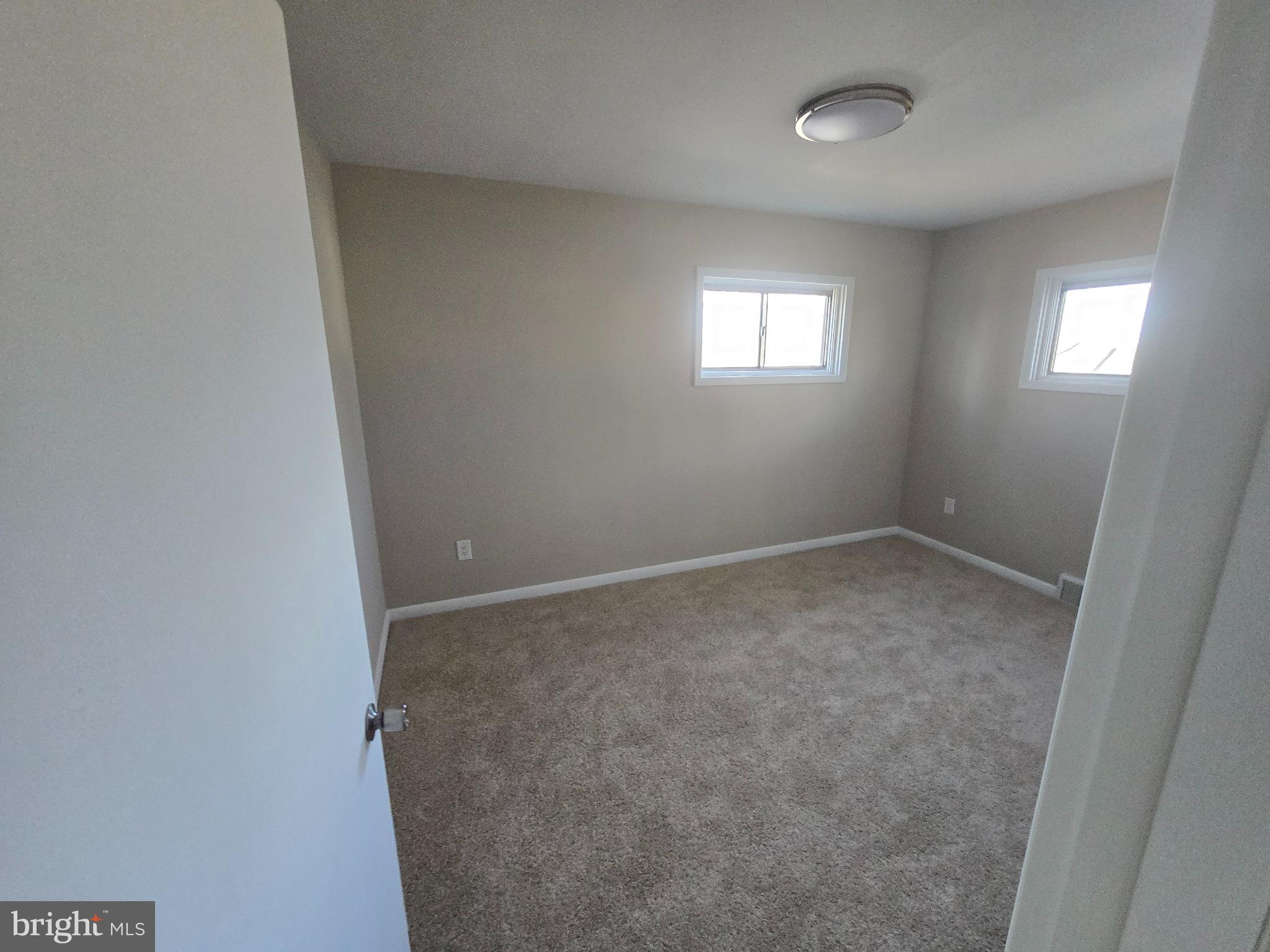 17721 Timberlane Hagerstown, MD 21740 - Photo 17 of 27 an empty room with windows and closet