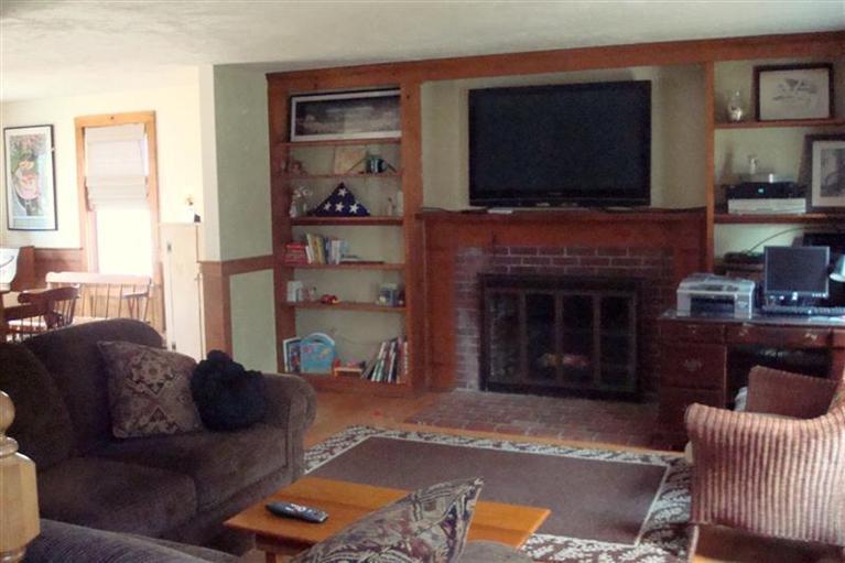 316 Meiggs Backus Road Sandwich, MA 02563 - Photo 6 of 11 a living room with furniture and a flat screen tv