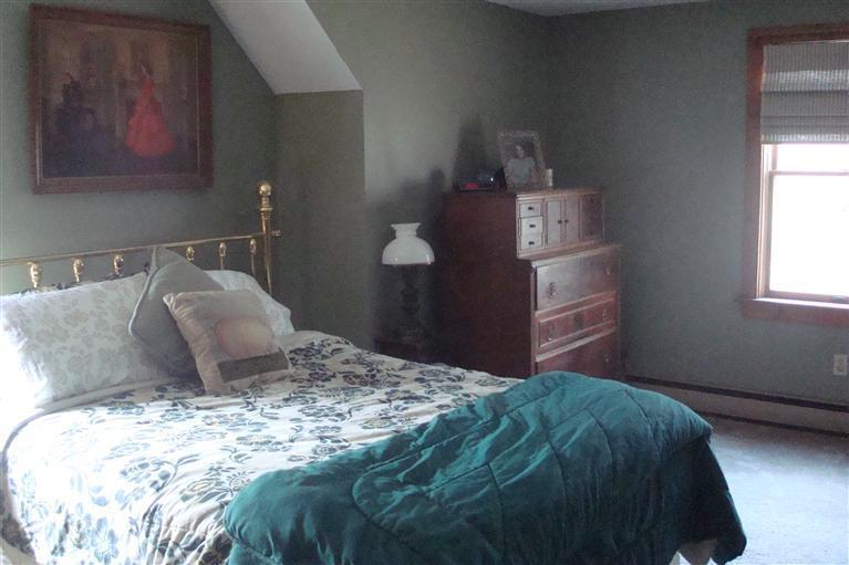 316 Meiggs Backus Road Sandwich, MA 02563 - Photo 8 of 11 a bedroom with a bed and dresser