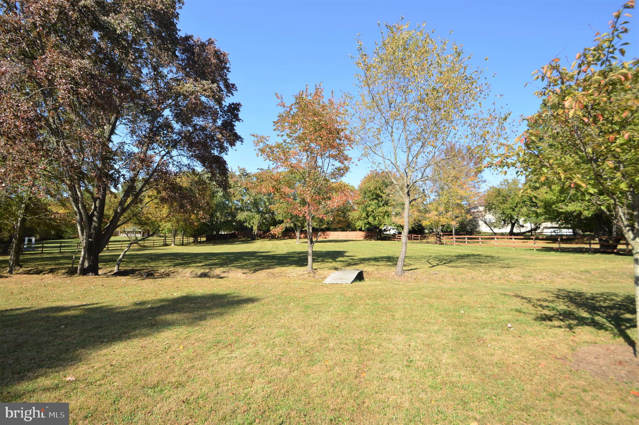 12614 Oxon Road Herndon, VA 20171 - Photo 16 of 71 a view of a swimming pool with an outdoor space and seating area