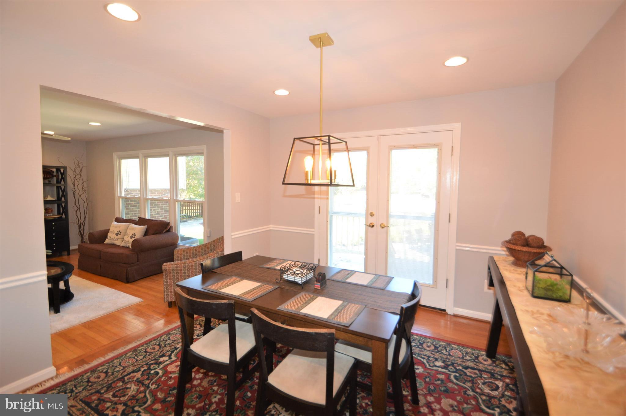 12614 Oxon Road Herndon, VA 20171 - Photo 35 of 71 a view of a dining room with furniture window and outside view