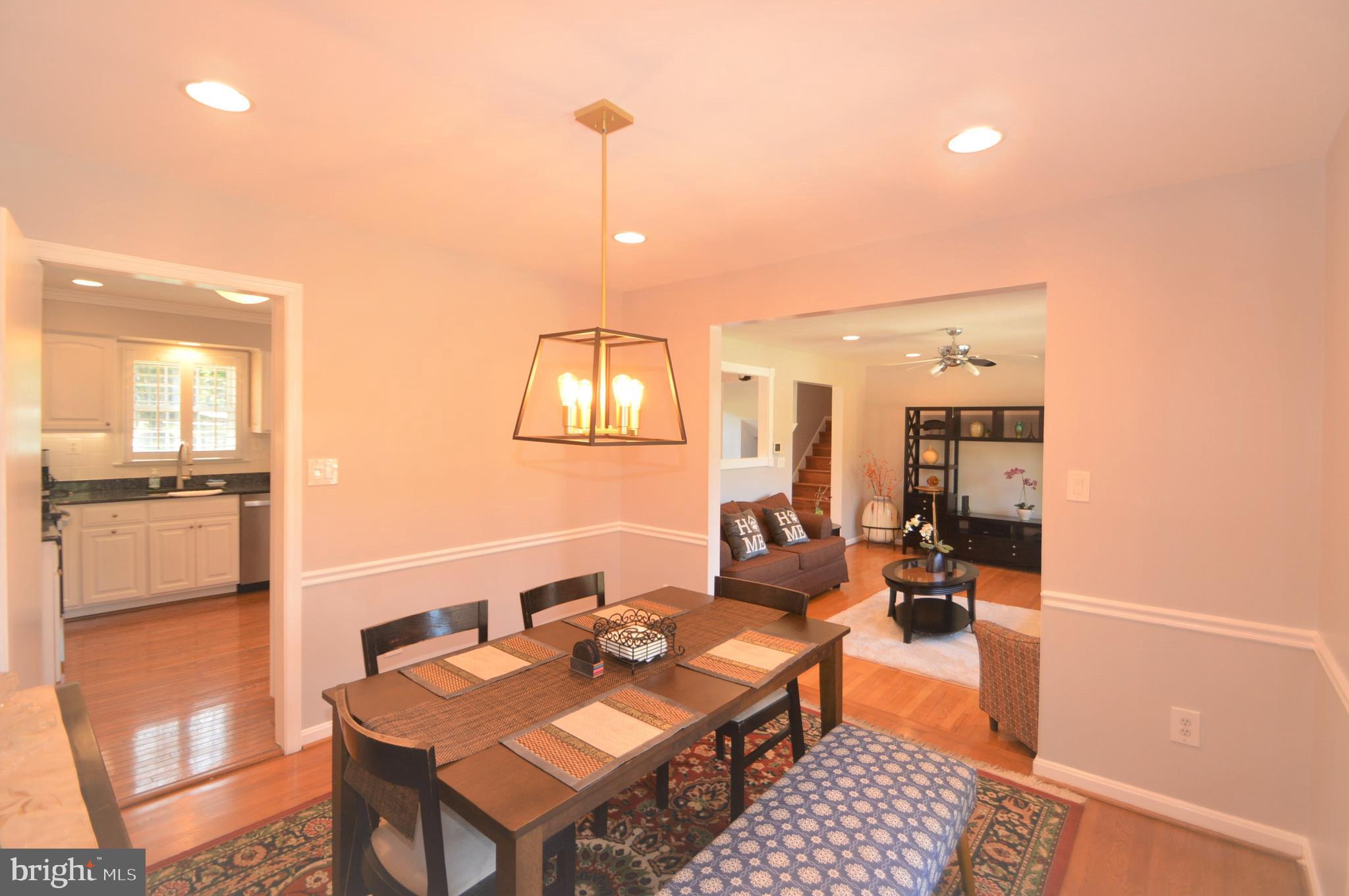 12614 Oxon Road Herndon, VA 20171 - Photo 38 of 71 a living room with furniture and wooden floor