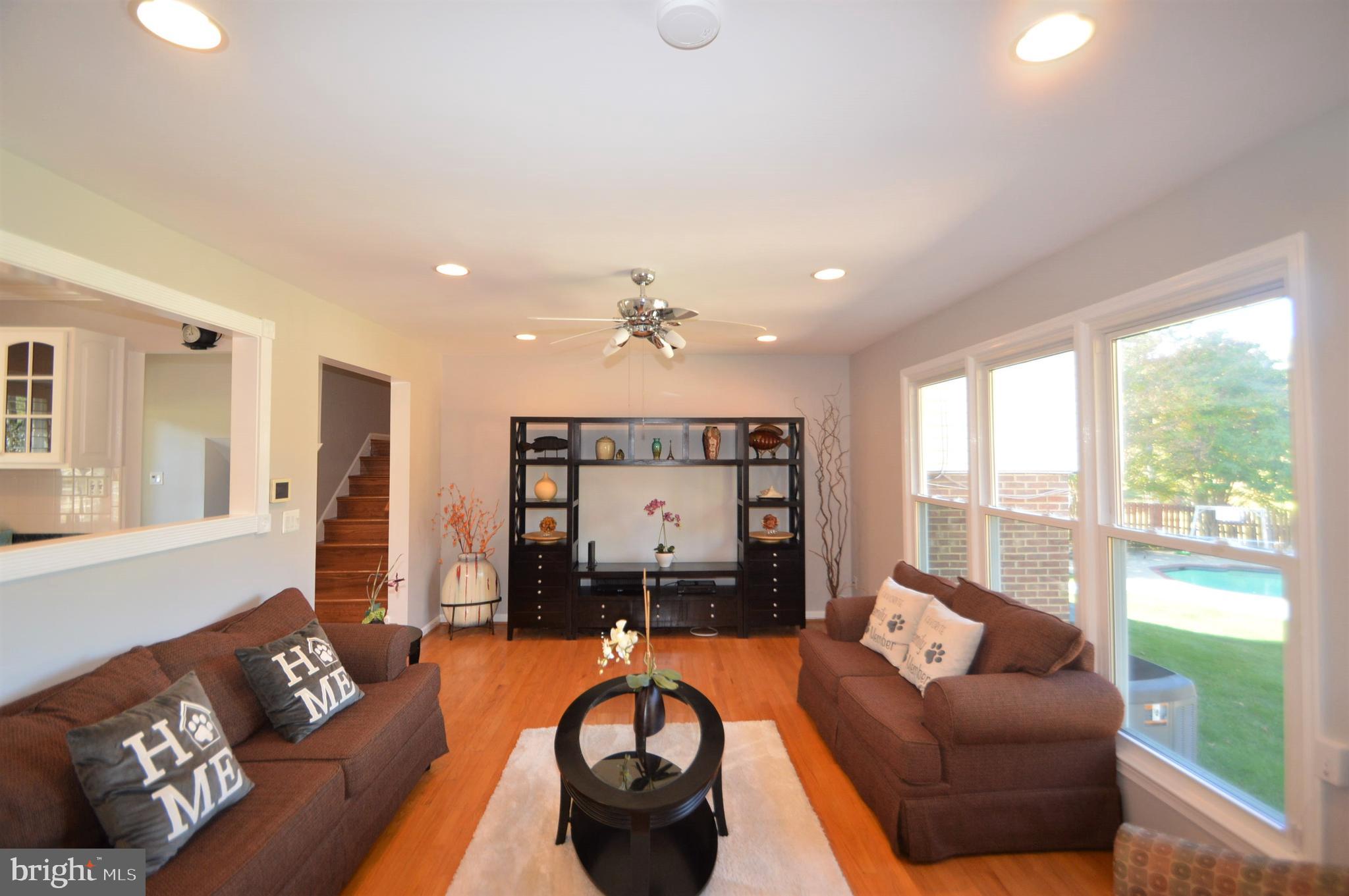 12614 Oxon Road Herndon, VA 20171 - Photo 39 of 71 a living room with furniture and a large window