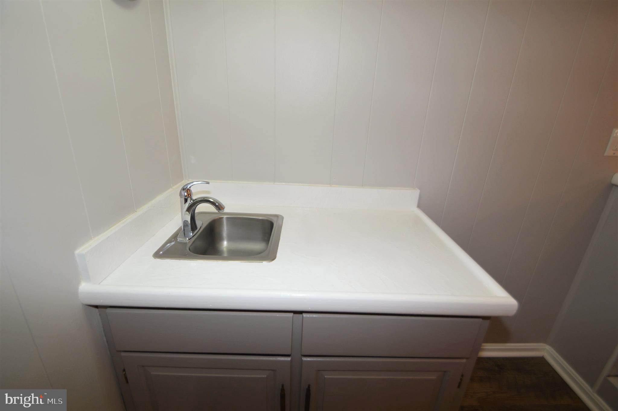 12614 Oxon Road Herndon, VA 20171 - Photo 64 of 71 a close up view of washer and dryer