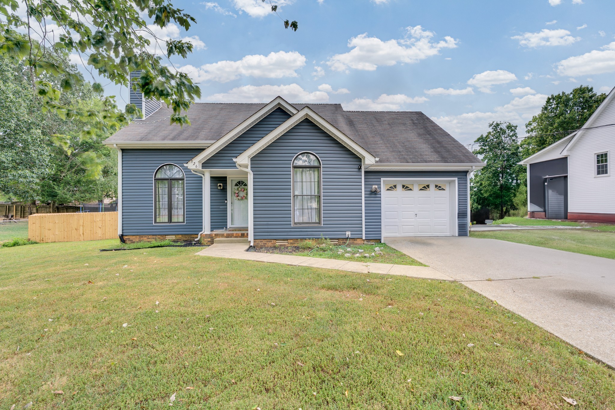 a house view with a outdoor space