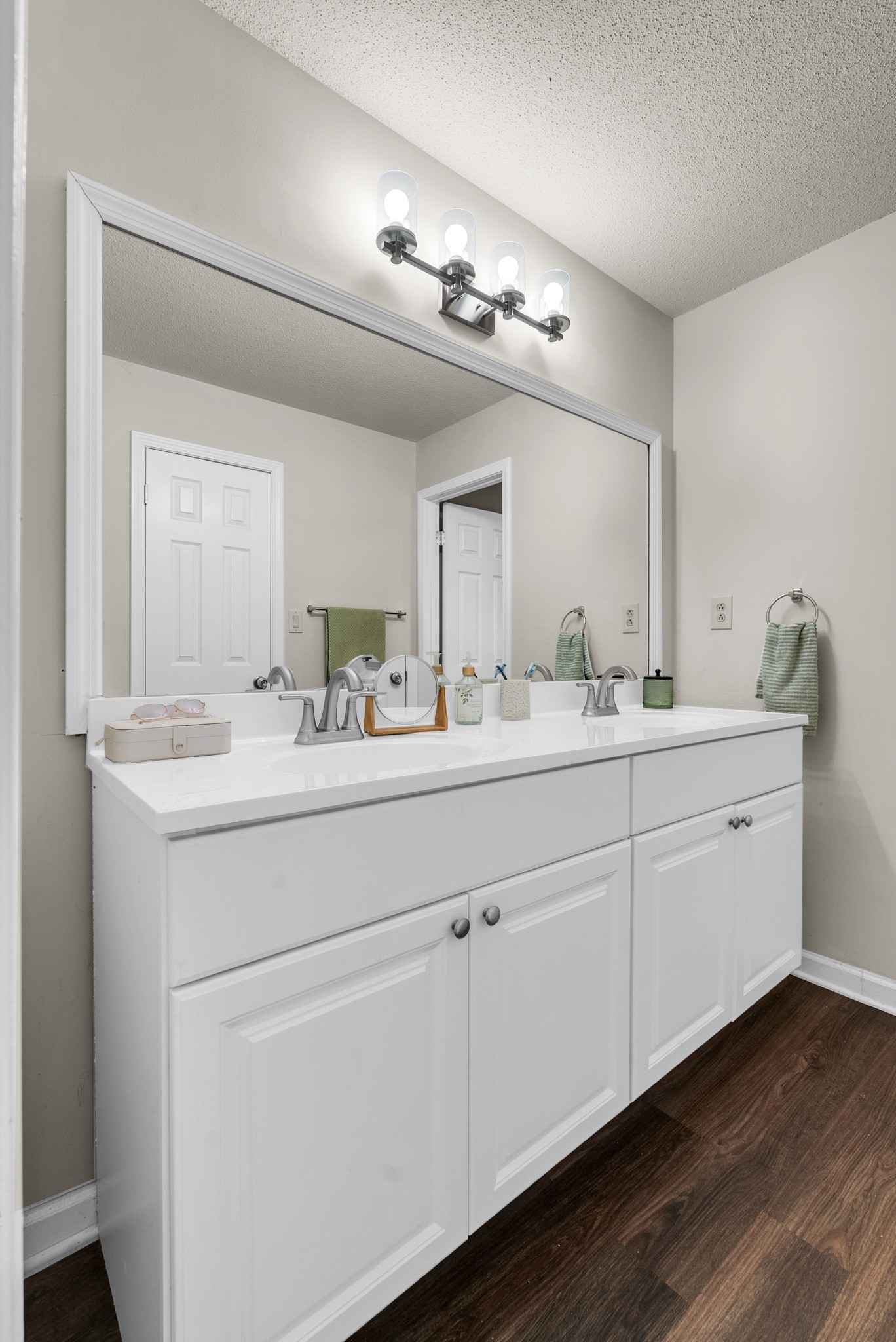 326 Lancaster Road Clarksville, TN 37042 - Photo 16 of 31 a bathroom with a double vanity sink and a mirror