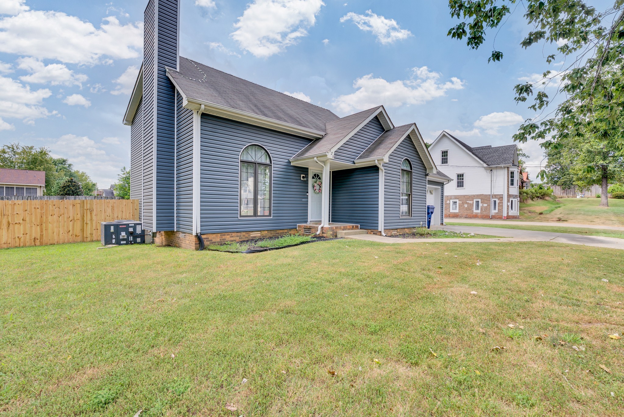 326 Lancaster Road Clarksville, TN 37042 - Photo 2 of 31 a house with swimming pool in front of it