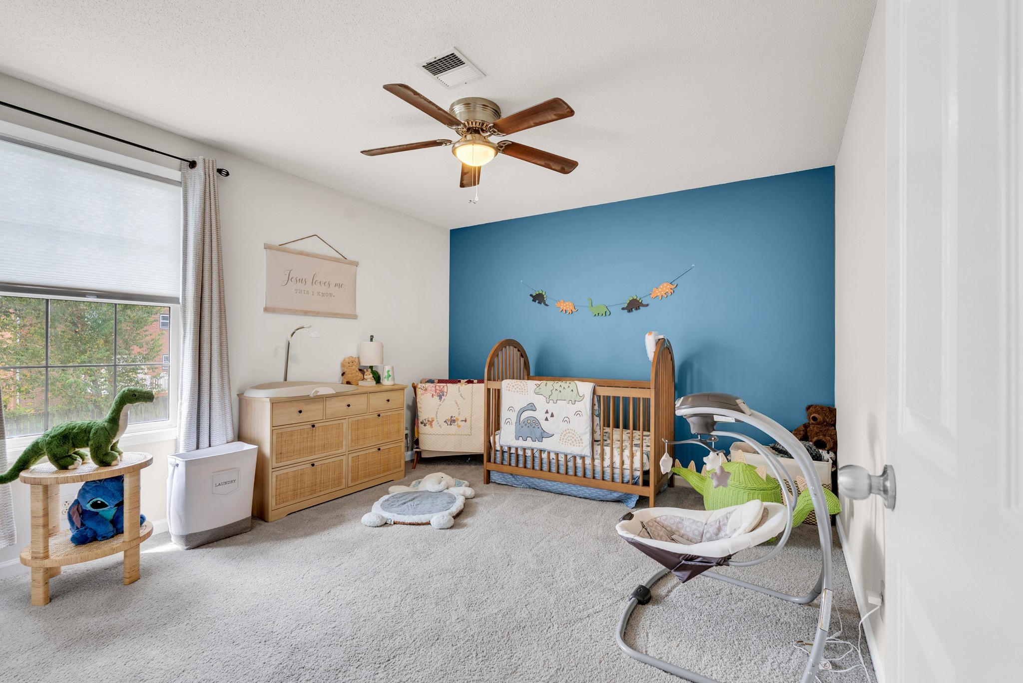 326 Lancaster Road Clarksville, TN 37042 - Photo 22 of 31 a living room with furniture and a chandelier