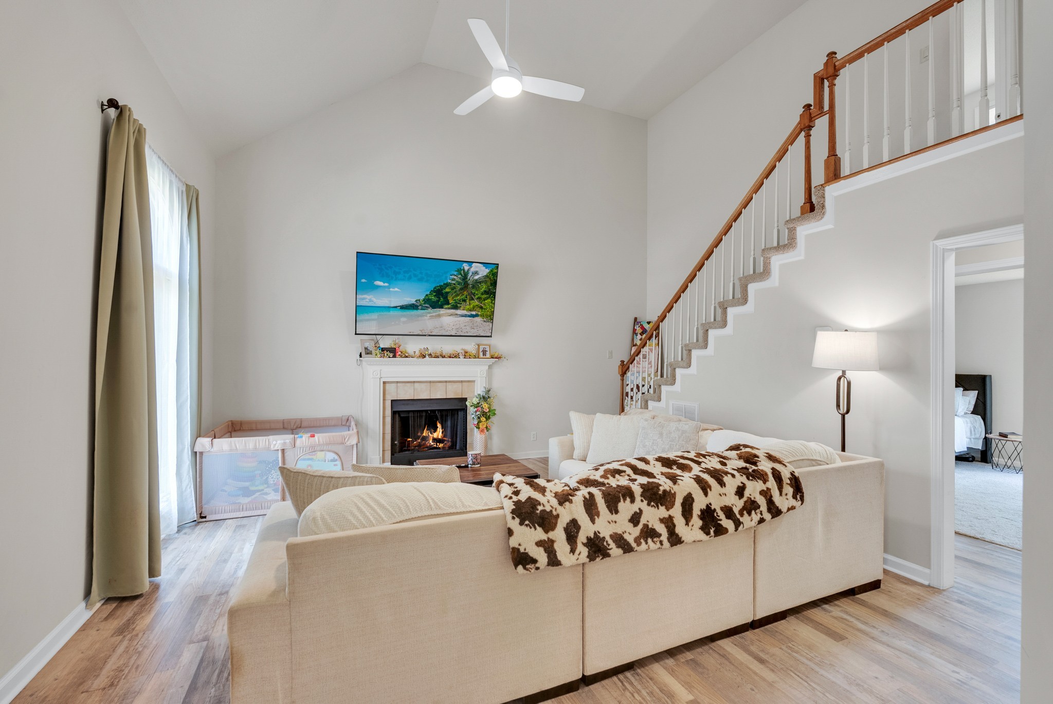 326 Lancaster Road Clarksville, TN 37042 - Photo 3 of 31 a living room with furniture fireplace and flat screen tv