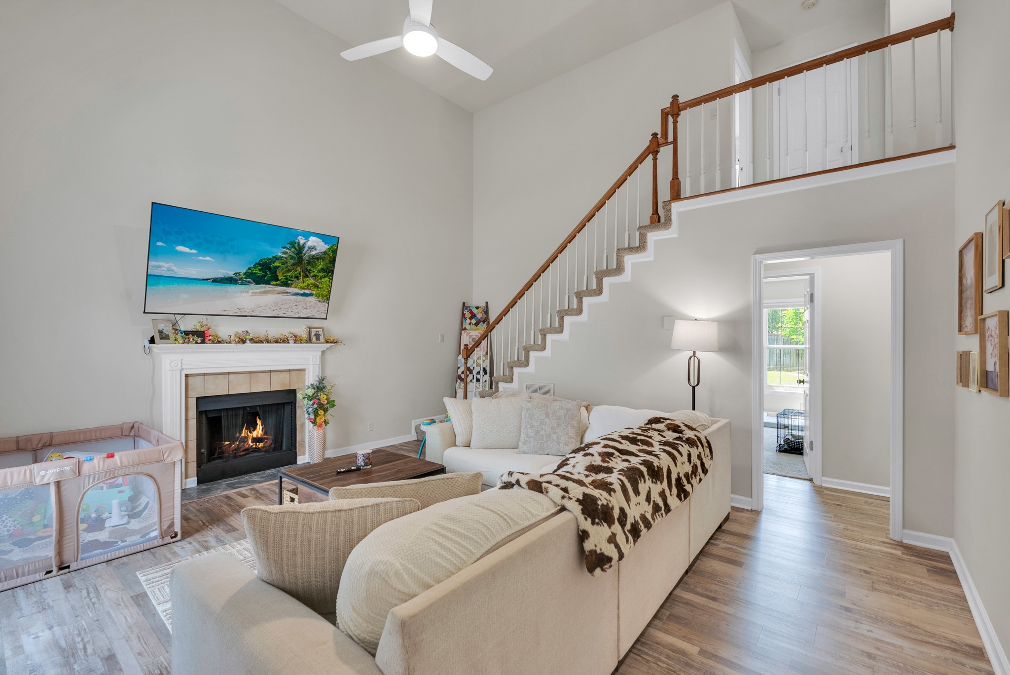 326 Lancaster Road Clarksville, TN 37042 - Photo 4 of 31 a living room with furniture and a fireplace