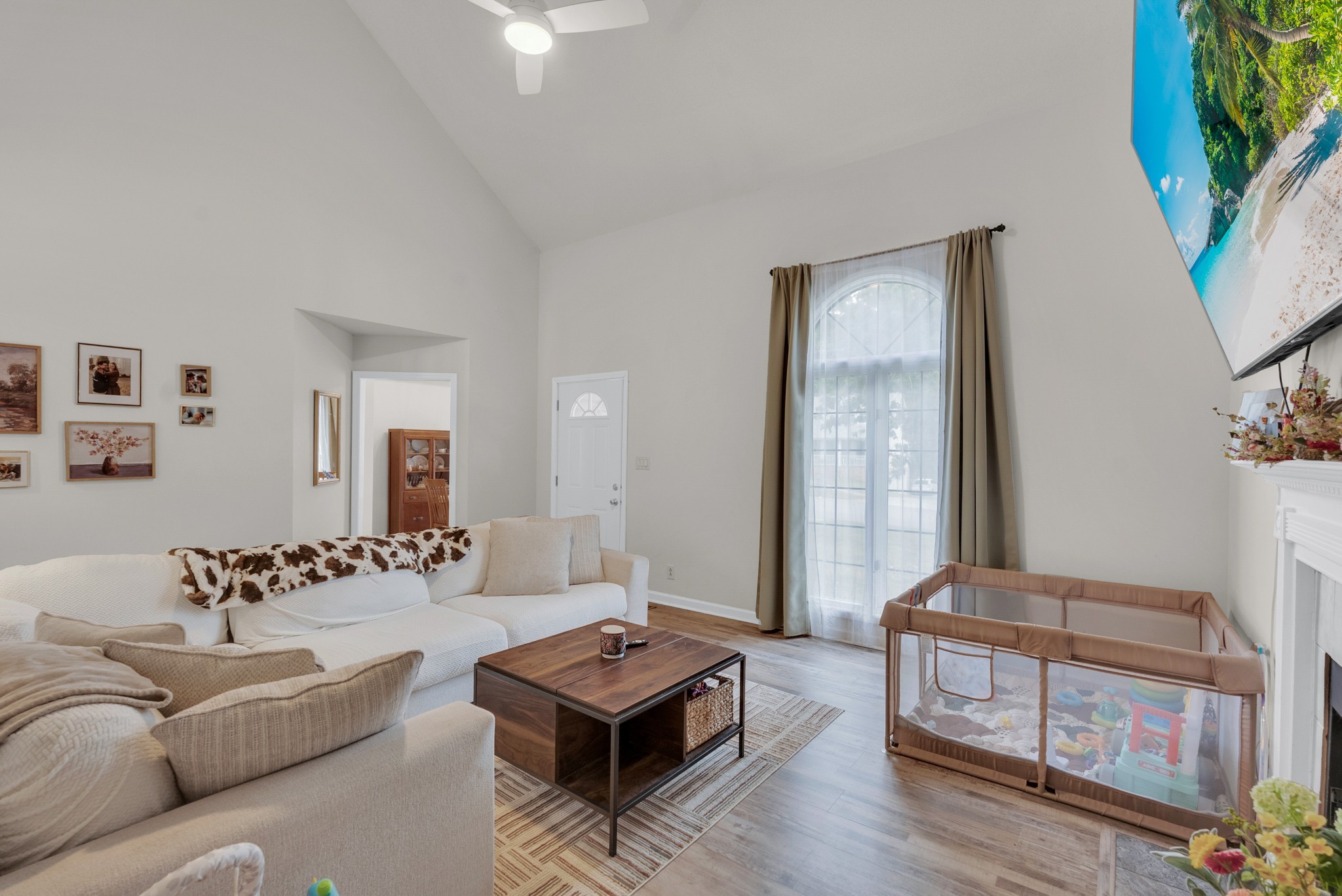 326 Lancaster Road Clarksville, TN 37042 - Photo 5 of 31 a living room with furniture and a window