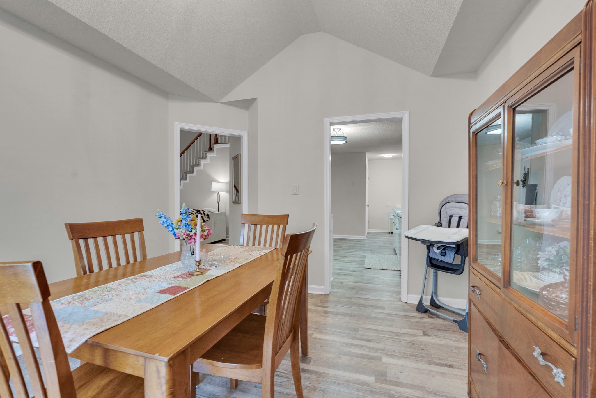326 Lancaster Road Clarksville, TN 37042 - Photo 6 of 31 a view of a dining room with furniture and wooden floor