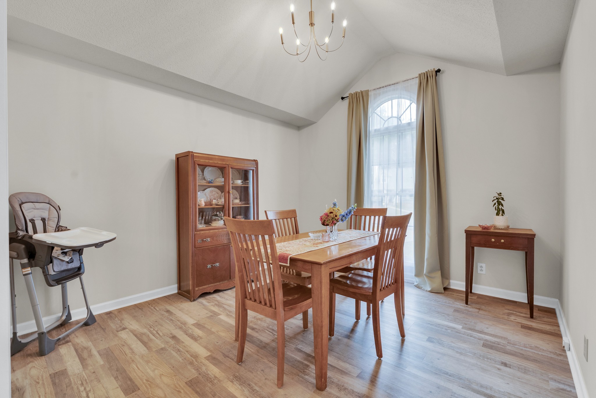 326 Lancaster Road Clarksville, TN 37042 - Photo 7 of 31 a view of a dining room with furniture and wooden floor