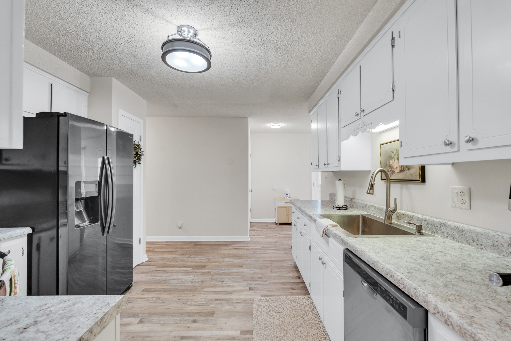 326 Lancaster Road Clarksville, TN 37042 - Photo 8 of 31 a large kitchen with stainless steel appliances granite countertop a granite counter tops and a sink