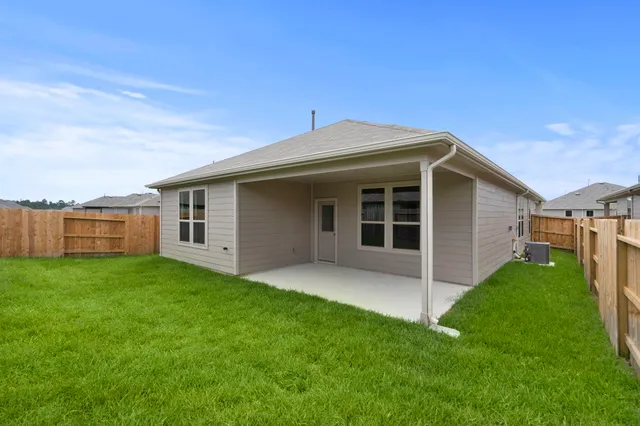 a view of a park with plants and lake view
