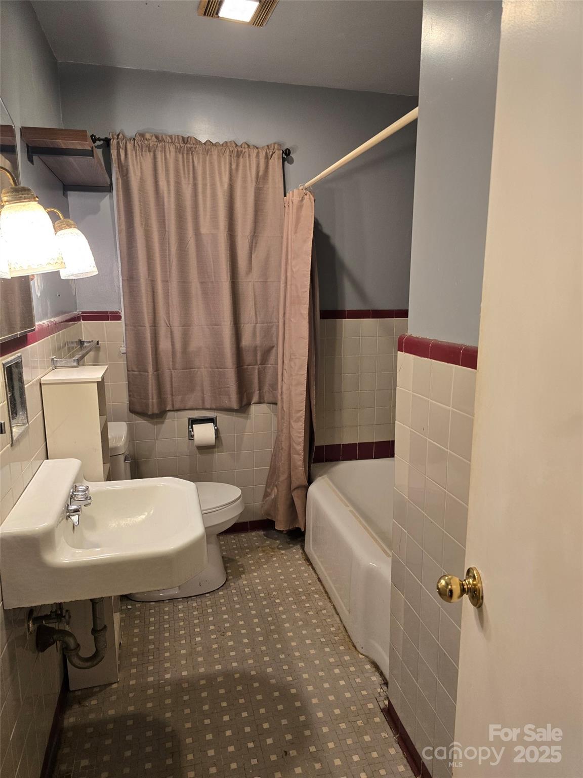 160 Williamson Street Troy, NC 27371 - Photo 11 of 24 a bathroom with a sink toilet and shower
