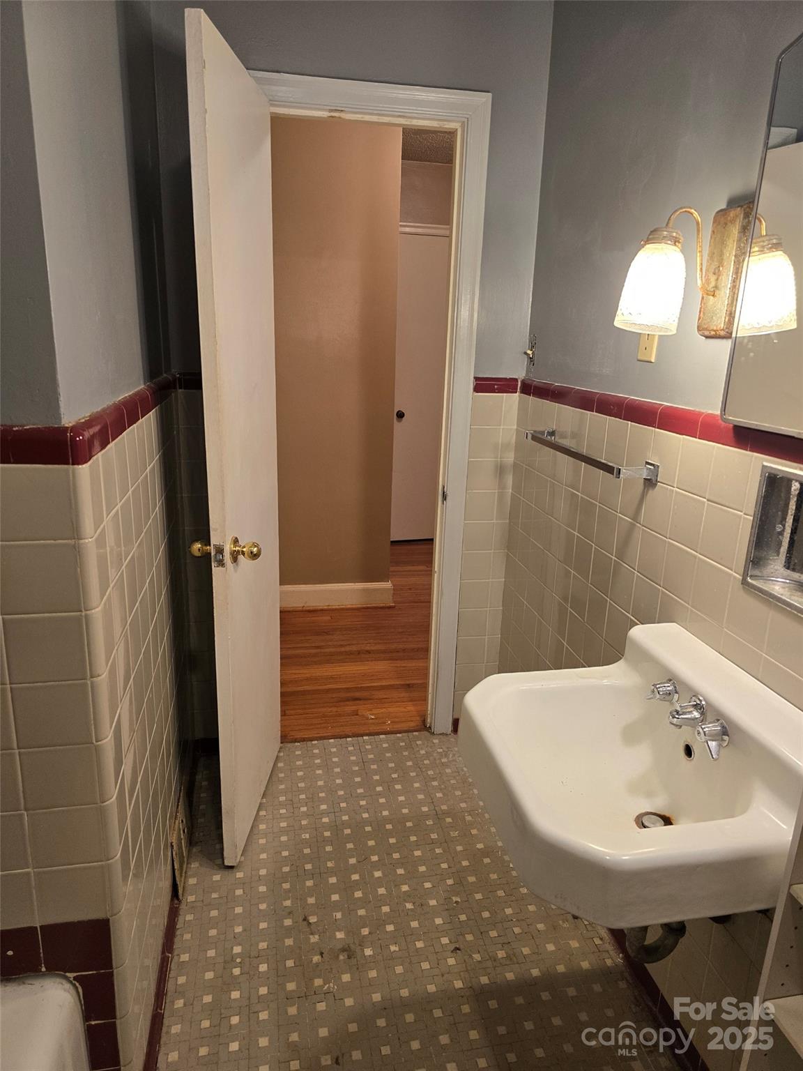 160 Williamson Street Troy, NC 27371 - Photo 12 of 24 a bathroom with a sink and shower