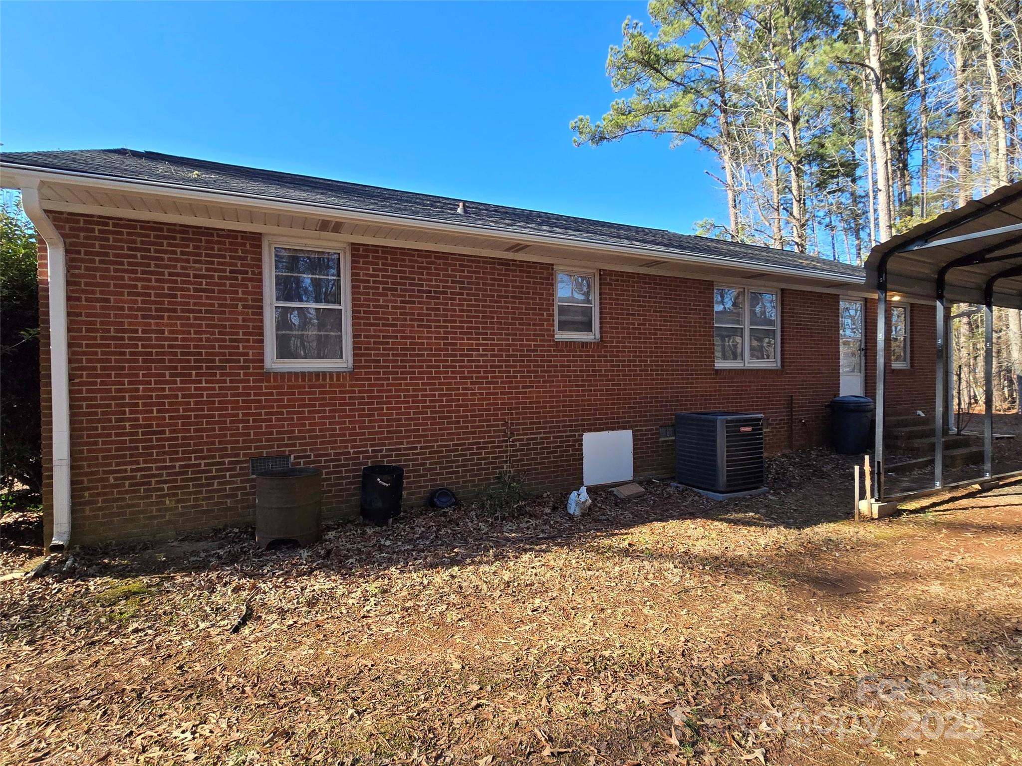 160 Williamson Street Troy, NC 27371 - Photo 20 of 24 a backyard of a house with shaded area