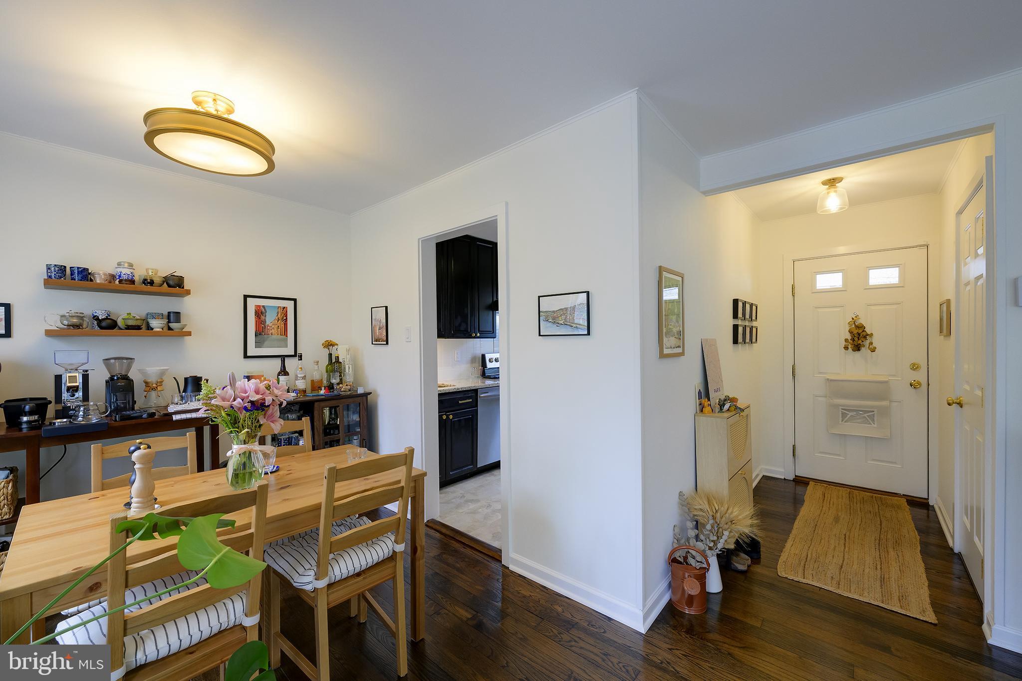 14 Laurel Hill Road Greenbelt, MD 20770 - Photo 12 of 41 a living room with furniture and a flat screen tv