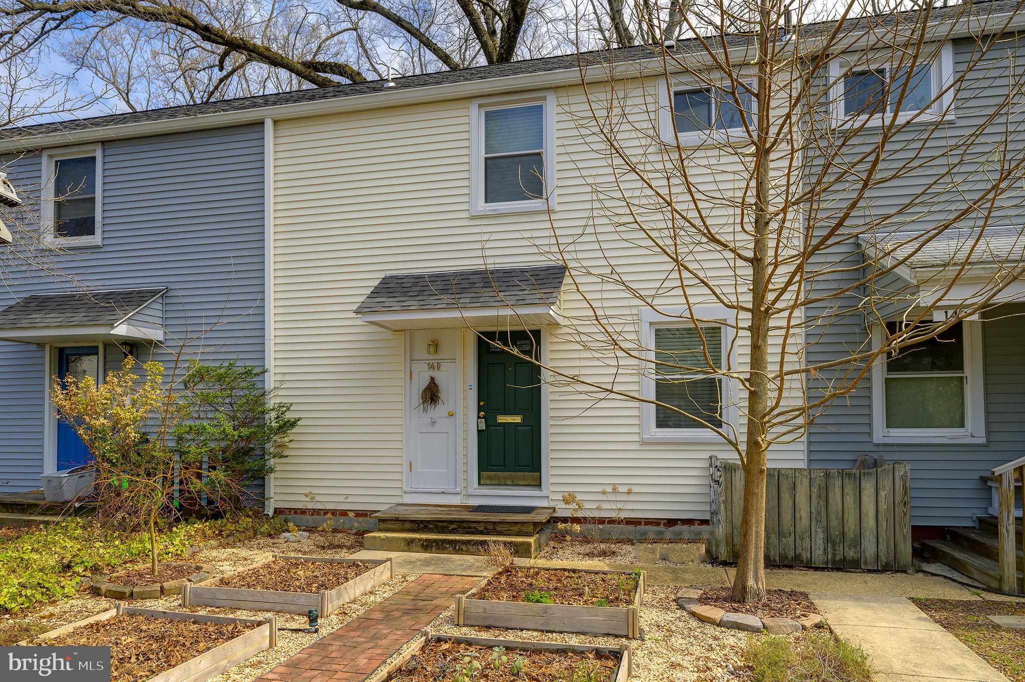 14 Laurel Hill Road Greenbelt, MD 20770 - Photo 3 of 41 a view of a house with a window and yard