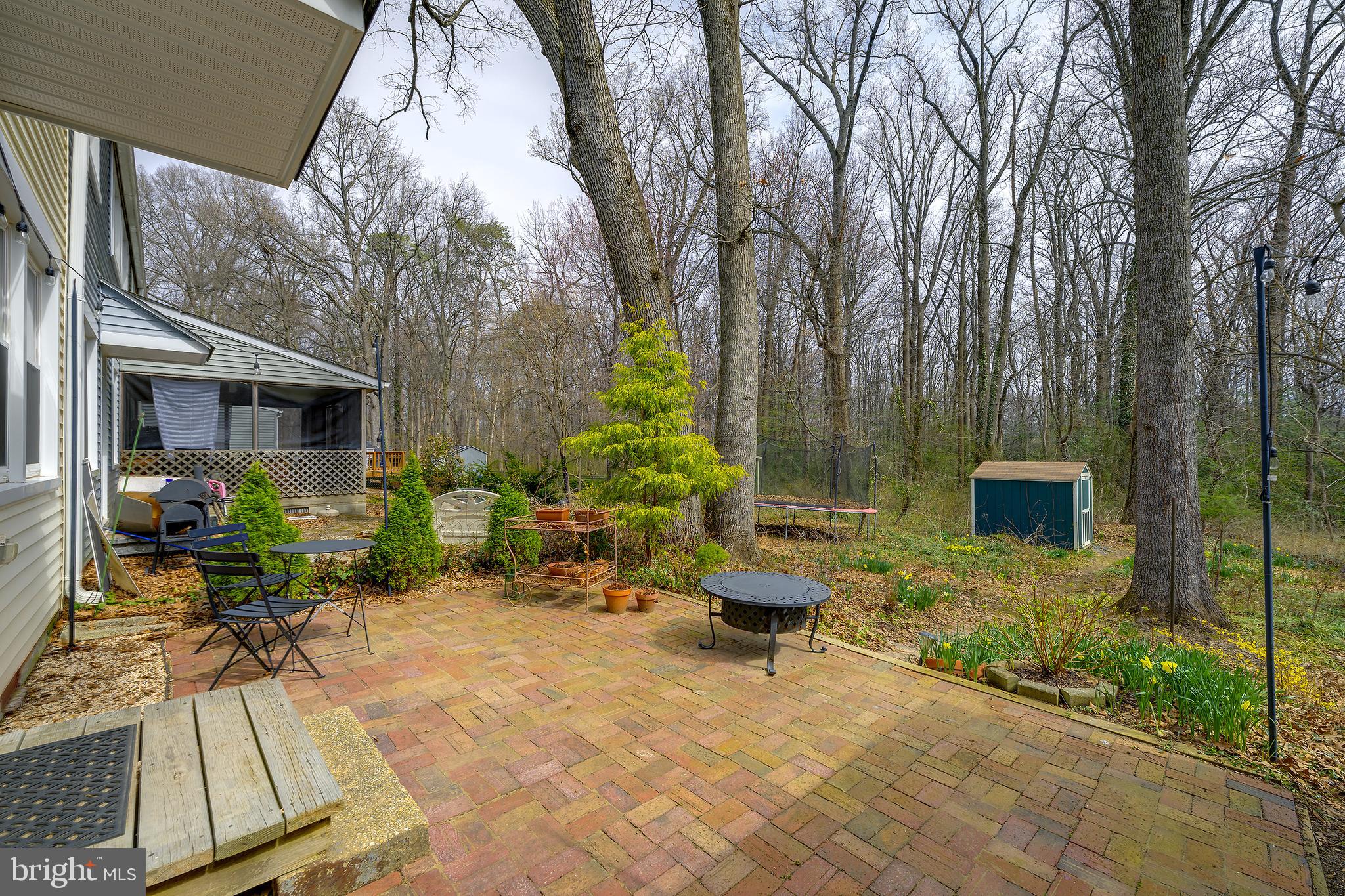 14 Laurel Hill Road Greenbelt, MD 20770 - Photo 33 of 41 a backyard of a house with outdoor seating