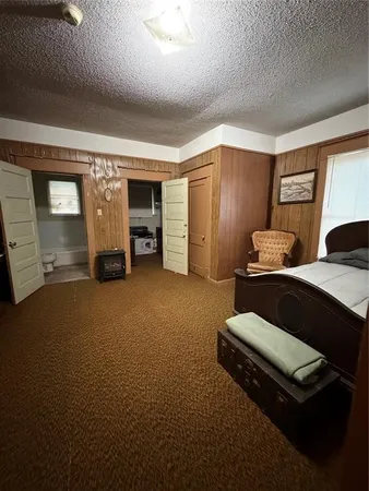 a bathroom with a sink a toilet and bathtub