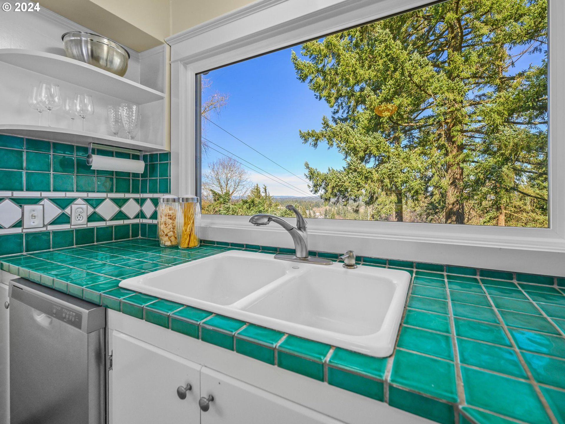 6435 Southwest Brugger Street Portland, OR 97219 - Photo 11 of 43 a wooden floor with a yard