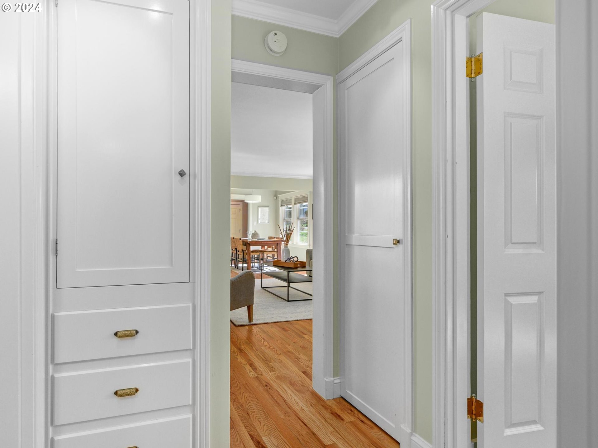 6435 Southwest Brugger Street Portland, OR 97219 - Photo 18 of 43 a view of a hallway and a livingroom and couch
