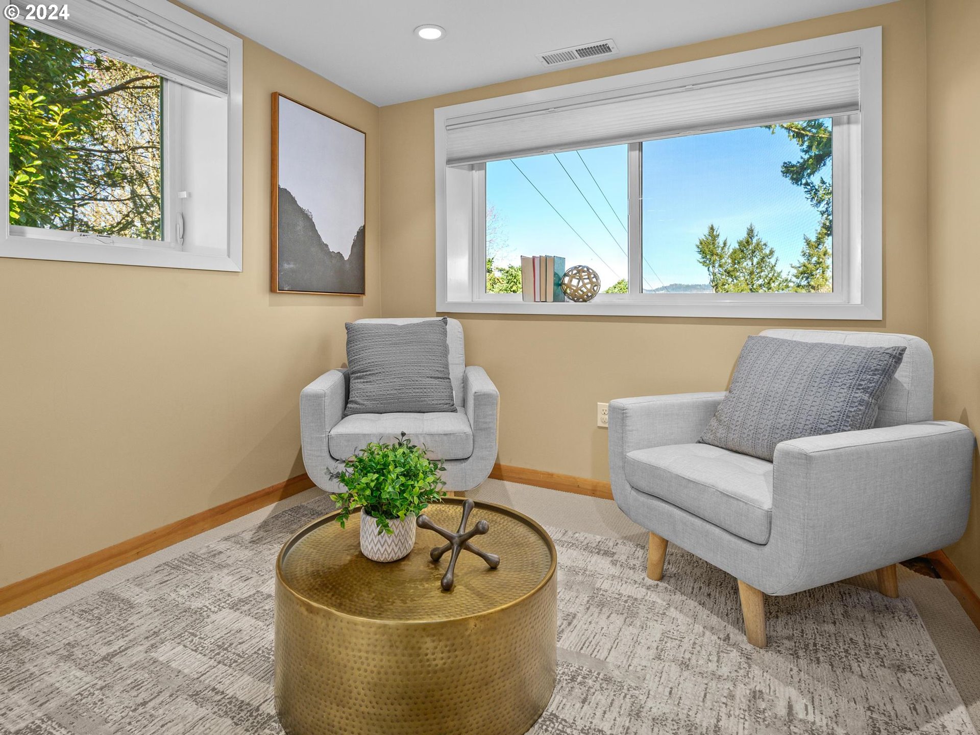 6435 Southwest Brugger Street Portland, OR 97219 - Photo 30 of 43 a living room with furniture and a potted plant